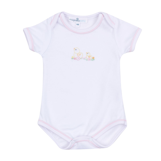 White Magnolia Baby short sleeve bodysuit with embroidered mama duck and duckling design and pink trim on neckline and sleeves.